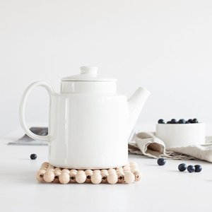 In 5 Schritten zum hübschen DIY-Untersetzer aus Holzkugeln In 5 Schritten zum hübschen DIY-Untersetzer aus Holzkugeln