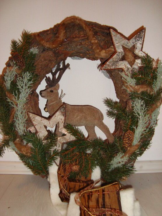 Winterlicher Kranz mit Hirsch Winterlicher Kranz mit Hirsch
