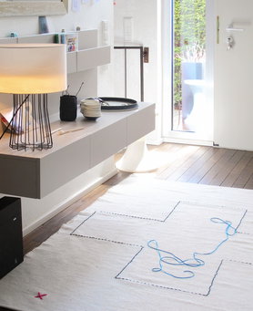 Teppichstickerei....