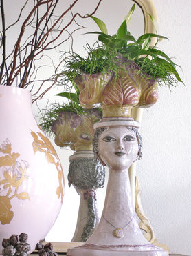 Pflanzen auf Frauenkopf