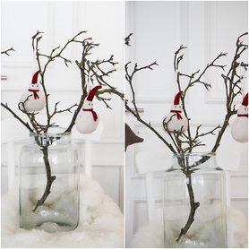 Magnolien Zweige  mit kleinen Schneemännern 