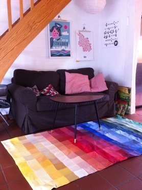 Teppich aus alten Stoffmusterbüchern